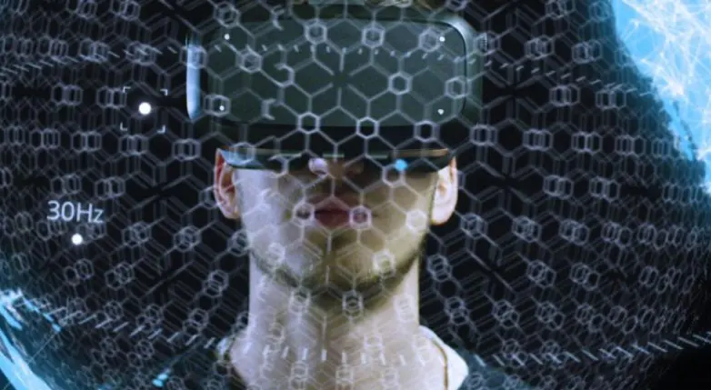 Man wearing a VR headset looking at a technological globe